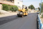 آسفالت منطقه پرتردد هشت بنگله به همت شرکت نفت و گاز مسجدسلیمان + گزارش تصویری